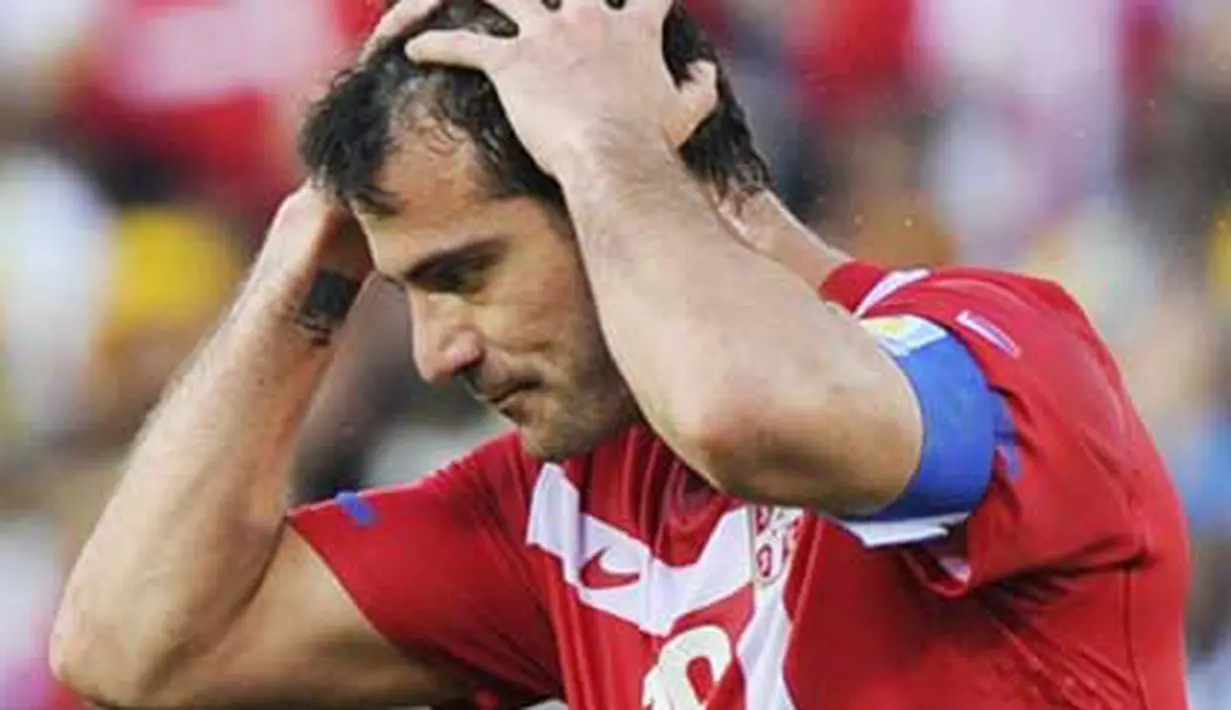 Kekecewaan gelandang Serbia Dejan Stankovic di laga penyisihan Grup D PD 2010 melawan Ghana di Loftus Verfeld Stadium, Pretoria, 13 Juni 2010. AFP PHOTO / GIANLUIGI GUERCIA