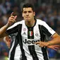 Alvaro Morata merayakan golnya ke gawang AC Milan. (REUTERS/Tony Gentile)