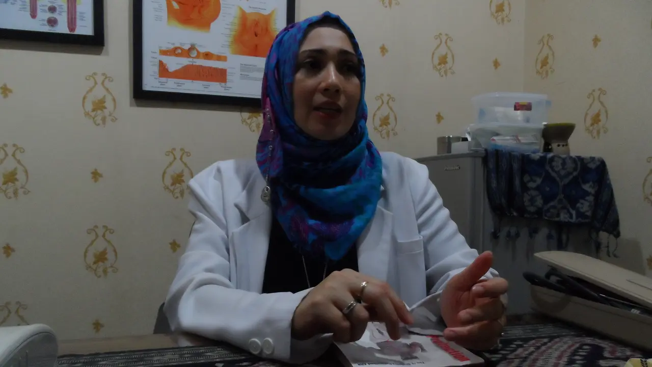 Dr Natasha Emir