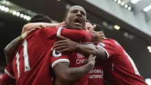 Bintang Liverpool, Georginio Wijnaldum, setelah mencetak gol ke gawang Middlesbrough, dalam pertandingan lanjutan Premier League, di Stadion Anfield, Minggu (21/5/2017). (AFP/Paul Ellis). 