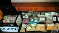  Beragam jenis narkoba berhasil diamankan petugas berupa 11.959 gram sabu, 20.717 butir ekstasi dan 799,08 gram heroin, Jakarta, Rabu (27/8/2014) (Liputan6.com/Faisal R Syam)
