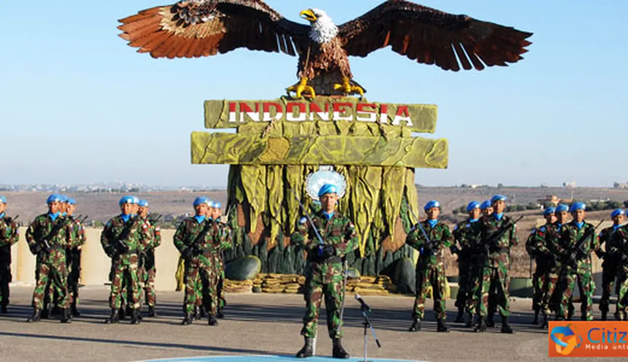Citizen6, Lebanon: Upacara peringatan HUT TNI ke-66 dilaksanakan oleh segenap prajurit TNI yang sedang mengemban misi perdamaian PBB, di Lapangan Parade Soekarno, Markas Batalyon UN Position 7-1, Adshit Al Qusayr, Lebanon Selatan, Rabu (5/10).