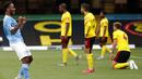 Penyerang Manchester City, Raheem Sterling,  merayakan gol yang dicetak ke gawang Watford pada laga Premier League di Stadion Vicarage Road, Selasa (22/7/2020). Manchester City menang dengan skor 4-0. (Adrian Dennis/Pool via AP)