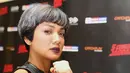 Nirina Zubir termasuk salah satu artis Indonesia yang kerap gonta-ganti warna rambut. Segala warna pernah ia coba. Mulai dari ungu, merah, biru, dan hijau. (Bambang E. Ros/Bintang.com)