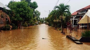 Wilayah Kecamatan Atinggola diterjang banjir bandang (Arfandi Ibrahim/Liputan6.com)