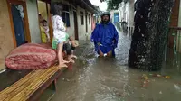 Banjir terjadi di sejumlah titik di Tangerang Selatan (Pramitha Tristiawati/Liputan6.com)