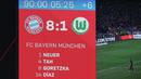 Skor 8-1 terpampang di layar lebar stadion Allianz Arena saat laga lanjutan Liga Jerman 2025/2026 antara Bayern Munchen melawan VfL Wolfsburg, Minggu (11/01/2026) waktu setempat. (AFP/Alexandra Beier)