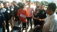 Rekonstruksi pengeroyokan TNI di Polda Metro Jaya. (Merdeka.com/Ronald)