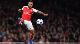 Gelandang Arsenal, Theo Walcott dikabarkan sedang diincar klub Spanyol, Valencia. Menurut salah satu media Spanyol, Los Che tertarik dengan kecepatan yang dimiliki Walcott. (AFP/Ben Stansall)