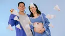 <p>Outfit kedua dengan tema bulu tangkis serba biru. Ribka mengenakan setelan biru dengan outer cardigan dipadukan bra top dan mini skirt menampilkan baby bumpnya. Serta Rian dengan jaket biru dipadukan kaos dan celana pendek abu-abu.</p>