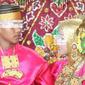 Sepasanga anak di bawah umur melangsungkan pernikahan di Mamuju (Foto: Liputan6.com/Istimewa)