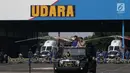 Kapolri Jenderal Pol Tito Karnavian memeriksa pasukan dalam upacara peringatan HUT Polisi Air dan Udara (Polairud) di Lapangan Udara Pondok Cabe, Tangerang Selatan, Selasa (25/12). Polairud memperingati HUT ke-67. (Liputan6.com/Faizal Fanani)