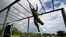 Perekrutan wanita itu merupakan bagian dari upaya untuk memperkuat peran perempuan dalam jajarannya. Melihat Tentara Wanita Kolombia Latihan Militer. (AFP/Raul Arboleda)