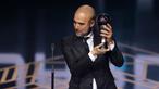 Pelatih Manchester City, Pep Guardiola mendapatkan penghargaan pelatih terbaik FIFA 2023 pada acara Best FIFA Football Awards yang berlangsung di Eventim Apollo, Hammersmith, London, Senin (15/01/2024) waktu setempat. Hal itu menyusul performa gemilangnya membawa The Cityzens memenangkan treble pada tahun lalu, yaitu Liga Inggris, Piala FA, dan Liga Champions. Guardiola memenangi penghargaan itu setelah mengumpulkan 28 poin, mengungguli Luciano Spalletti (Napoli), dan Simone Inzaghi (Inter Milan) dalam pemungutan suara. Pelatih berkebangsaan Spanyol itu unggul 10 angka dari Spalletti, dan 17 angka dari Inzaghi. (AFP/Adrian Dennis)