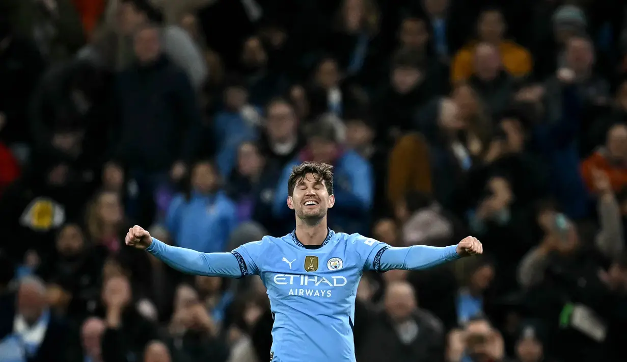 Tandukan John Stones pada menit ke-64 mempertebal keunggulan Manchester City atas Sparta Praha. (Paul ELLIS/AFP)
