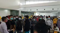 Pekerja migran dari Malaysia tiba di Indonesia (Foto: Liputan6.com/Dian Kurniawan)