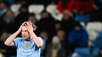 Manchester City menelan kekalahan telak dari Tottenham Hotspur pada laga pekan ke-11 Premier League musim ini, Minggu (24/11/2024) dini hari WIB. (AFP/Paul Ellis)