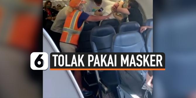 VIDEO: Penumpang Pesawat Buat Keributan Karena Tolak Pakai Masker