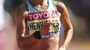 Ines Henriques dari Portugal bersaing dalam lomba lari atletik wanita 50km di Kejuaraan Dunia IAAF 2017 di The Mall di London (13/8). Ines Henriques mencatatkan rekor dunia baru dalam lomba lari 50 kilometer putri tersebut. (AFP Photo/Daniel Leal-Olivas)