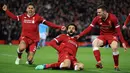 Selebrasi pemain Liverpool, Mohamed Salah (tengah) setelah mencetak gol ke gawang Manchester City pada leg pertama perempat final Liga Champions di Anfield, Liverpool, Inggris, Rabu (4/4). Liverpool menang tiga gol tanpa balas. (Peter Byrne/PA via AP)