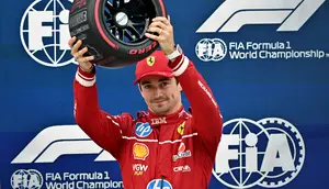 Pembalap Scuderia Ferrari, Charles Leclerc saat meraih pole position F1 GP Hungaria 2025. (Attila KISBENEDEK / AFP)