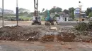 Alat berat terlihat di Terminal Terpadu Depok atau Metro Stater di lahan terminal di Jalan Margonda Raya, Depok, Jawa Barat, Kamis (6/9). (Liputan6.com/Immanuel Antonius)