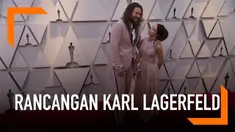 Pasangan Jason Momoa dan Lisa Bonet mengenakan pakaian yang dirancang oleh Karl Lagerfeld di Oscar 2019. Ini rancangan Karl terakhir sebelum ia meninggal pada 19 Februari 2019.