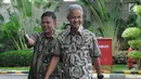 Gubernur Jawa Tengah Ganjar Pranowo (kanan) tiba di Gedung KPK, Jakarta, Jumat (10/5/2019). Ganjar diperiksa sebagai saksi kasus dugaan korupsi proyek pengadaan kartu tanda penduduk berbasis elektronik (e-KTP). (merdeka.com/Dwi Narwoko)