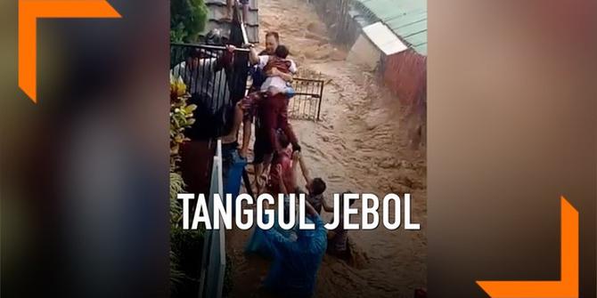 VIDEO: Tanggul Jebol, Anak-Anak Terjebak Banjir di Sekolah