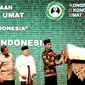 Presiden Joko Widodo (Jokowi) didampingi Ketua MUI Ma'ruf Amin dan Menkoperekonomian Darmin Nasution resmi membuka Kongres Ekonomi Umat yang digelar Majelis Ulama Indonesia (MUI) di Hotel Grand Sahid, Jakarta, Sabtu (22/4). (Biro Pers Istana)