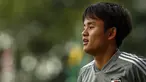 Gelandang Jepang, Takefusa Kubo melakukan pemanasan saat sesi latihan jelang turnamen Copa America 2019 di Sao Paulo, Brasil (13/6/2019). Remaja sensasional Jepang yang dijuluki 'Messi Jepang' ini resmi bergabung dengan Real Madrid. (AFP Photo/Miguel Schincariol)