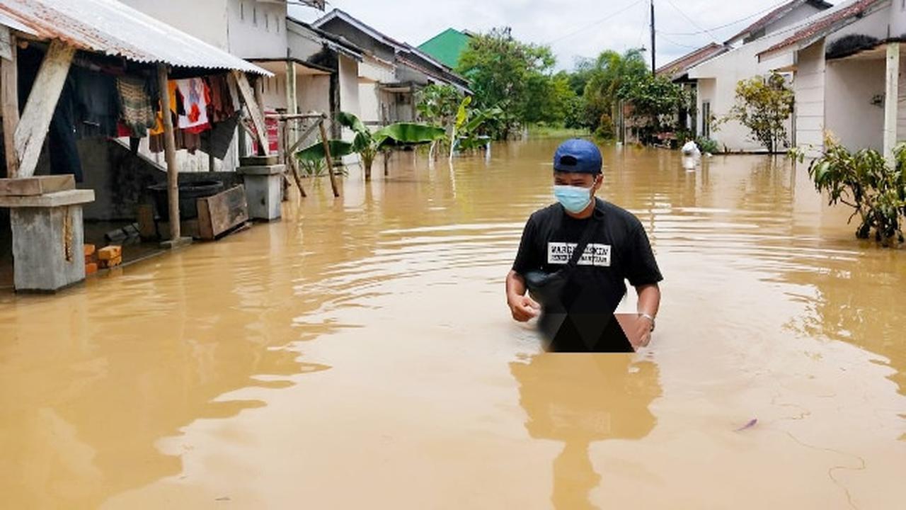 Perumahan di Pekanbaru yang terendam banjir.