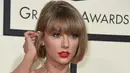 Selain Live Instagram, ternyata Taylor pun pernah ikut andil dalam polling Instagram yang dibuat fansnya. Saat itu, Pollingnya berkaitan dengan album baru Taylor yang bertajuk Reputation. (AFP/Valerie Macon)