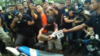 Rekontruksi pembunuhan siswi SMP Benhil (Achmad Sudarno/Liputan6.com)