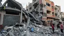 Juru bicara otoritas pertahanan sipil Gaza Mahmud Bassal, pada Rabu (24/9/2025), mengatakan bahwa beberapa orang yang tersisa berlindung di pusat kota ketika sejumlah serangan udara menghantam mereka. (Eyad BABA/AFP)