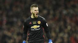1. David De Gea (Manchester United) – Kiper 27 tahun ini mencatatkan clean sheet terbanyak di Premier League musim ini dengan 15 kali. Penampilan apik pria asal Spanyol itu membuatnya disebut-sebut sebagai kiper terbaik liga Inggris. (AFP/Glyn Kirk)
