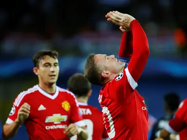 Kapten Manchester United, Wayne Rooney, tampil gemilang dengan mencetak tiga gol ke gawang Club Brugge dalam leg kedua babak play-off Liga Champions di Stadion Jan Breydel, Belgia. Kamis (27/8/2015) dini hari WIB. (Reuters/Yves Herman)