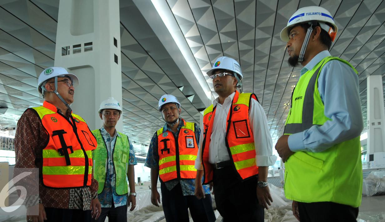 Terminal 3 Ultimate yang ditargetkan selesai eai 2016 ini memiliki kapasitas 25 juta penumpang per tahun, Tangerang, Banten, Rabu (27/1/2016). Terminal ini akan melayani penerbangan internasional dan domestik. (Liputan6.com/Faisal R Syam)  