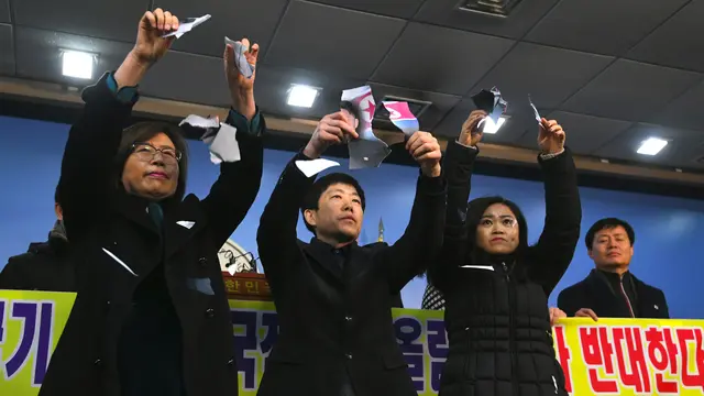 Berhasil ke Korea Selatan, Pembelot Korea Utara Robek Foto Kim Jong-un
