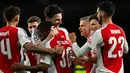 Berlaga pada leg kedua 16 besar Liga Champions 2024/2025, Arsenal dan PSV Eindhoven bermain imbang 2-2. (Glyn KIRK/AFP)