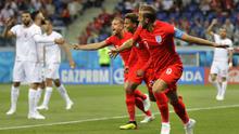 Striker Inggris, Harry Kane, merayakan gol yang dicetaknya ke gawang Tunisia pada laga Grup G Piala Dunia di Volgograd Arena, Volgograd, Senin (18/6/2018). Inggris menang 2-1 atas Tunisia. (AP/Sergei Grits)