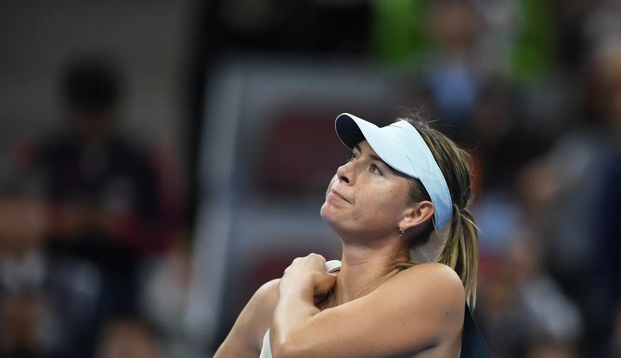 Sementara itu, masih belum diketahui bagia mana adegan yang melibatkan petenis Rusia tersebut. (GREG BAKER / AFP)