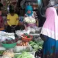 Pedagang Sayur di Pasar Benhil, Wati (44). Sumber: liputan6.com/Bawono