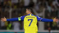 Selebrasi pemain Al Nassr, Cristiano Ronaldo setelah menjebol gawang Al Wehda dalam pertandingan lanjutan pekan ke-16 Liga Arab Saudi 2022/2023 yang berlangsung di King Abdulaziz Sports City Stadium, Jumat (10/2/2023) WIB. Ronaldo mencetak quattrick saat Al Nassr mengalahkan Al Wehda dengan skor telak 4-0. (AFP)