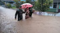 Banjir dengan tinggi sekitar 1,5 meter merendam 1.014 rumah di Kecamatan Labuan, Kabupaten Pandeglang, Banten, sejak pagi tadi, Rabu (26/12/2018).