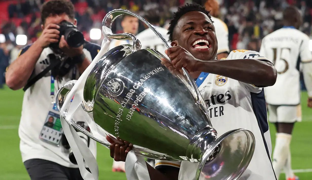 Di menit ke-83, Vinicius Junior menggandakan keunggulan Real Madrid atas Borussia Dortmund. (AP Photo/Ian Walton)