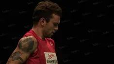 Pada laga final BCA Indonesia Open 2016 di Istora Senayan, Minggu (5/6/2016), pebulutangkis tunggal putra Denmark, Jan O Jorgensen, memakai kaos tanpa lengan yang membuat koleksi tatonya terlihat jelas. (Bola.com/Vitalis Yogi Trisna)