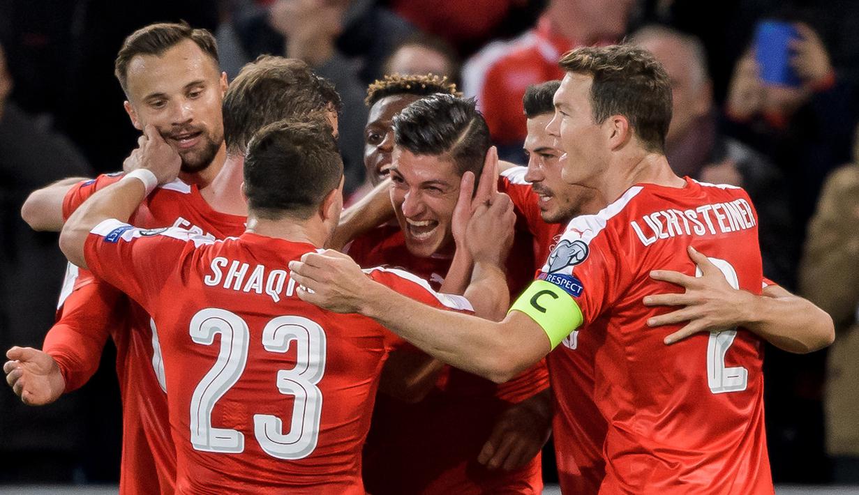 Swiss menempati peringkat ketujuh rangking FIFA dengan koleksi 1210 poin. (AFP/Fabrice Coffrini)