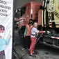 Petugas mengisi bahan bakar jenis Biosolar pada kendaraan di SPBU Pertamina di Jakarta, Rabu (17/2/2021). Kementerian ESDM juga mencatat, pemanfaatan biodiesel telah memberikan perangkat sekitar Rp38,31 triliun. (merdeka.com/Iqbal S. Nugroho)