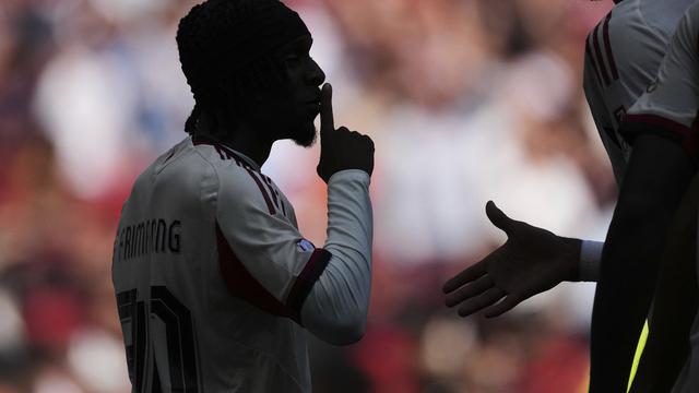 Selebrasi bek Liverpool, Jeremie Frimpong, usai menjebol gawang Crystal Palace di laga Community Shield di Stadion Wembley, Minggu (10/08/2025). (AP Photo/Dave Shopland).